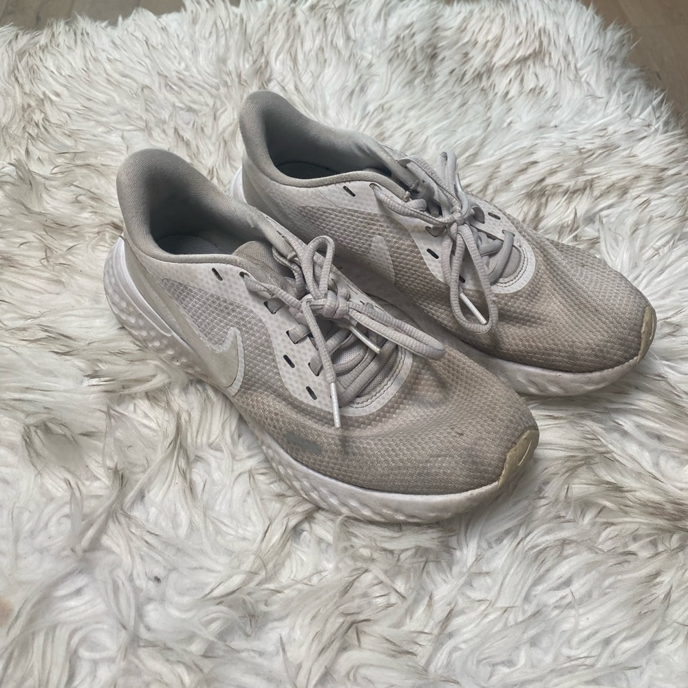 White Nike running shoes